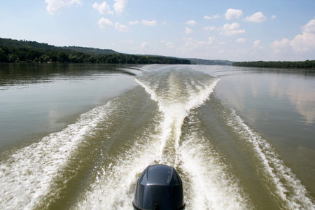 Traveling on Danube River with Motor Boat near Novi Sad in Vojvodina, Serbia.