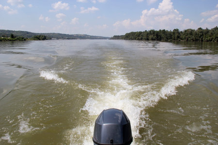 Traveling on Danube River with Motor Boat near Novi Sad in Vojvodina, Serbia.