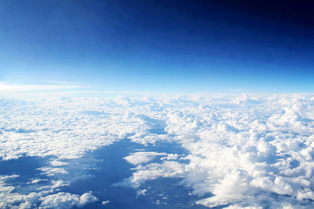 Sunny Sky View with Clouds from Airplaneの写真素材