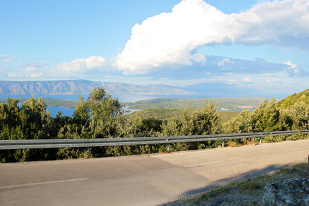 Road at Hvar Island with Green and Sea Nature Landscape in Croatiaの写真素材