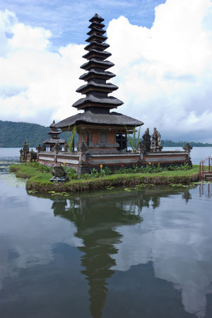 Lake Bratan, high up in the central mountains of Bali, is famous for its lakeside templeの写真素材