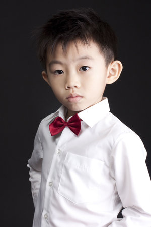 Chinese boy dress with bow tieの写真素材