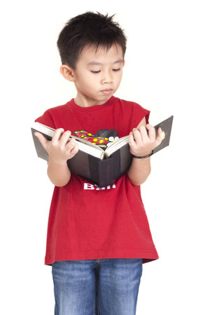 Chinese boy readingの写真素材