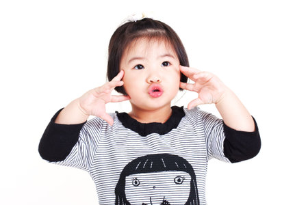 Cute little chinese girlの写真素材