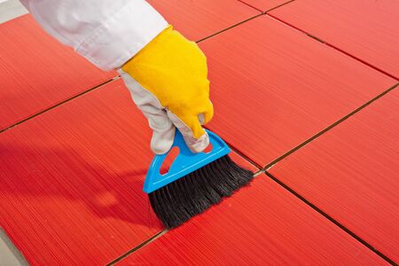 Hand brush clean dust jointの写真素材