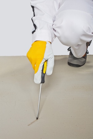 sharp tool checking cement floorの写真素材