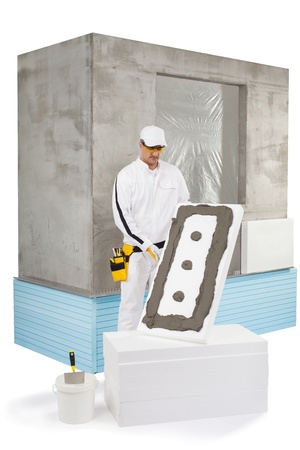 Worker holding an insulation panel coated with a luteの写真素材