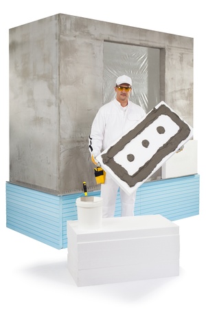 Worker holding an insulation panel coated with a luteの写真素材