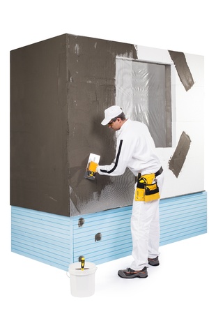 Worker spreading a puttyの写真素材