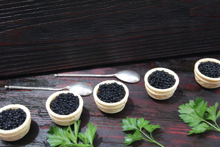 Black and red caviar for guests and friends.の写真素材