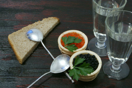 Black and red caviar for guests and friends.