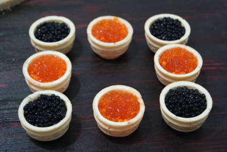 Black and red caviar for guests and friends.の写真素材