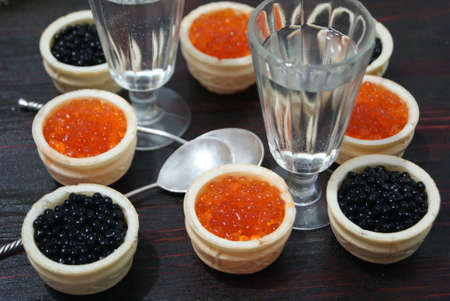 Black and red caviar for guests and friends.の写真素材