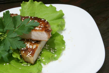 Beef steak on lettuce leaves.の写真素材