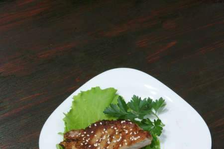 Beef steak on lettuce leaves.の写真素材