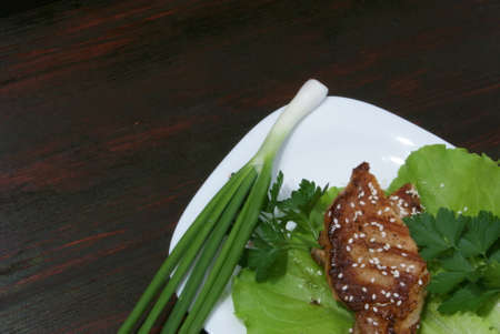 Beef steak on lettuce leaves.の写真素材