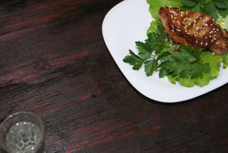 Beef steak on lettuce leaves.の写真素材