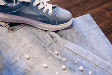 Women's clothing and accessories. Jeans, purse and shoes.の写真素材