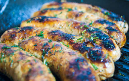 Cooking German sausages with beer.の写真素材