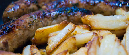 Cooking German sausages with beer.の写真素材