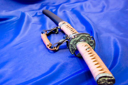 Japanese katana sword. The weapon of a samurai. A formidable weapon in the hands of a master of martial artsの写真素材