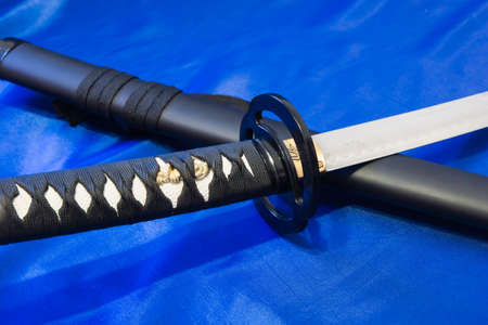 Japanese katana sword. The weapon of a samurai. A formidable weapon in the hands of a master of martial artsの写真素材