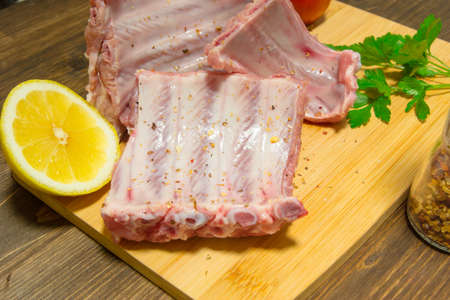 Cooking succulent ribs at home in the kitchen. Haute cuisine at home. Kosher food during the holidaysの写真素材