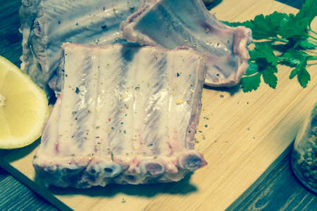 Cooking succulent ribs at home in the kitchen. Haute cuisine at home. Kosher food during the holidaysの写真素材