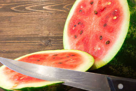 Fresh and juicy watermelon on the plate. Ripe watermelon to the delight of childrenの写真素材