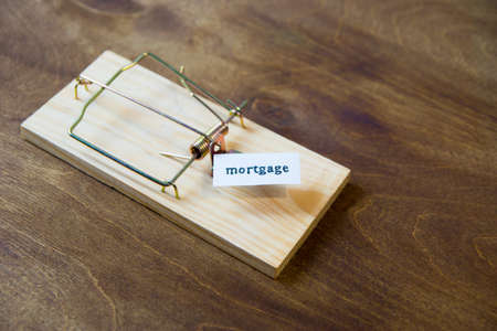 Mousetrap. Do not fall for the bait. Always think about the consequencesの写真素材