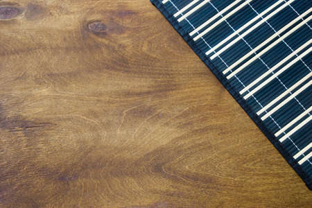 Kitchen towel on a wooden table. The background on the kitchen theme.の写真素材