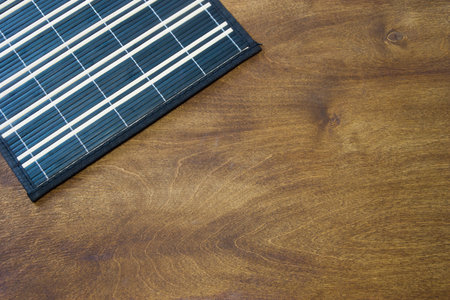Kitchen towel on a wooden table. The background on the kitchen theme.