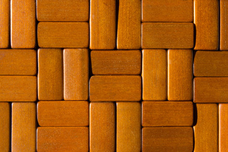 wooden tiles on the wall. wood mosaic for interior decoration.