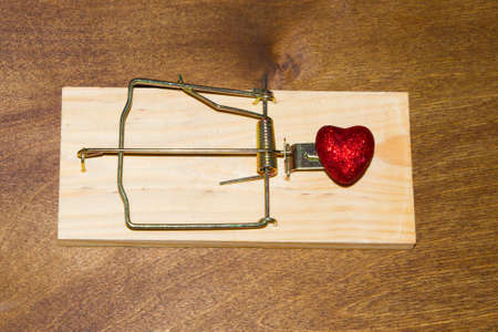 Mousetrap. Do not fall for the bait. Always think about the consequencesの写真素材