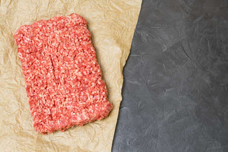 Minced meat on a black background.の写真素材