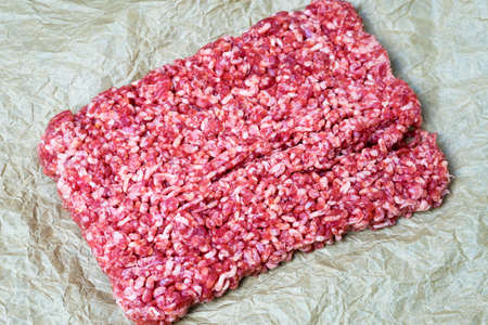 Minced meat on a black background. Place for your text...の写真素材