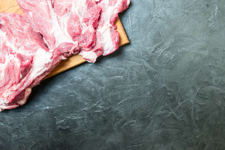 Raw meat on a cutting Board. place for your text...の写真素材