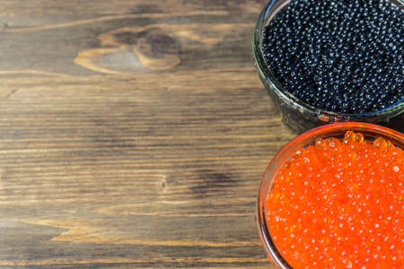 Festive sandwiches with red and black caviar. Healthy and tasty food...の写真素材