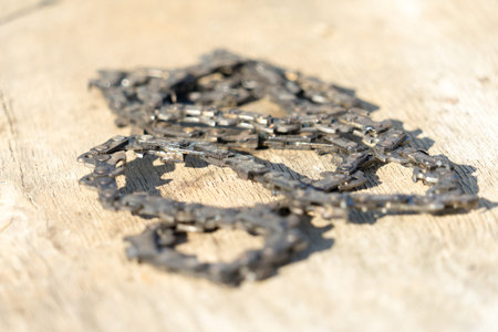Old chainsaw chain. Place for your text.