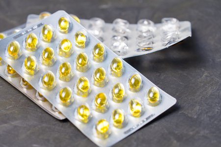 Fish oil capsules in blister pack. Place for your text