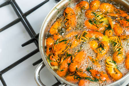 Boil the crayfish in a pot. Place for your textの写真素材