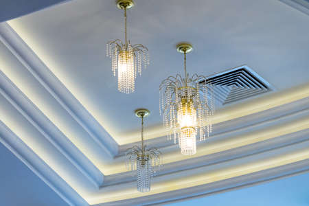 Crystal chandelier hanging from the ceiling. Place for your text..の写真素材