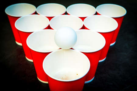 beer pong. A very popular game at parties with young people. beer pong. A very popular game at parties with young people.の写真素材