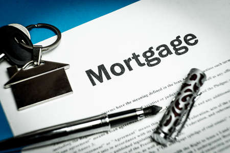 The contract for a mortgage loan. The keys of the property. The contract for a mortgage loan. The keys of the property.の写真素材