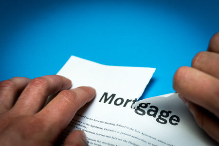 A broken mortgage contract. Photo of the document. A broken mortgage contract. Photo of the...