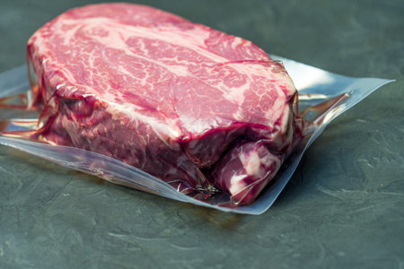 The marbled beef steak in a vacuum pack.
