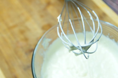 Mixing ingredients to prepare a complex dish. Mixing ingredients to prepare a complex dish.