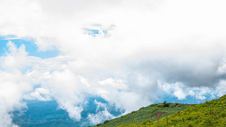 Beautiful clouds and fog cover the mountains, traveling concept.の写真素材