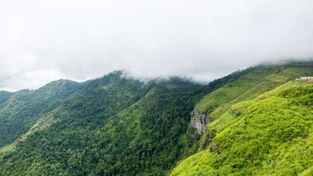 Beautiful clouds and fog cover the mountains, traveling concept.の写真素材