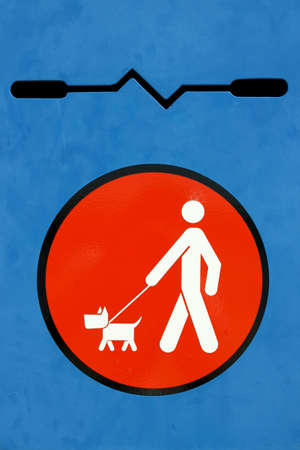 Modern metallic sign, painted, regarding dog walksの写真素材